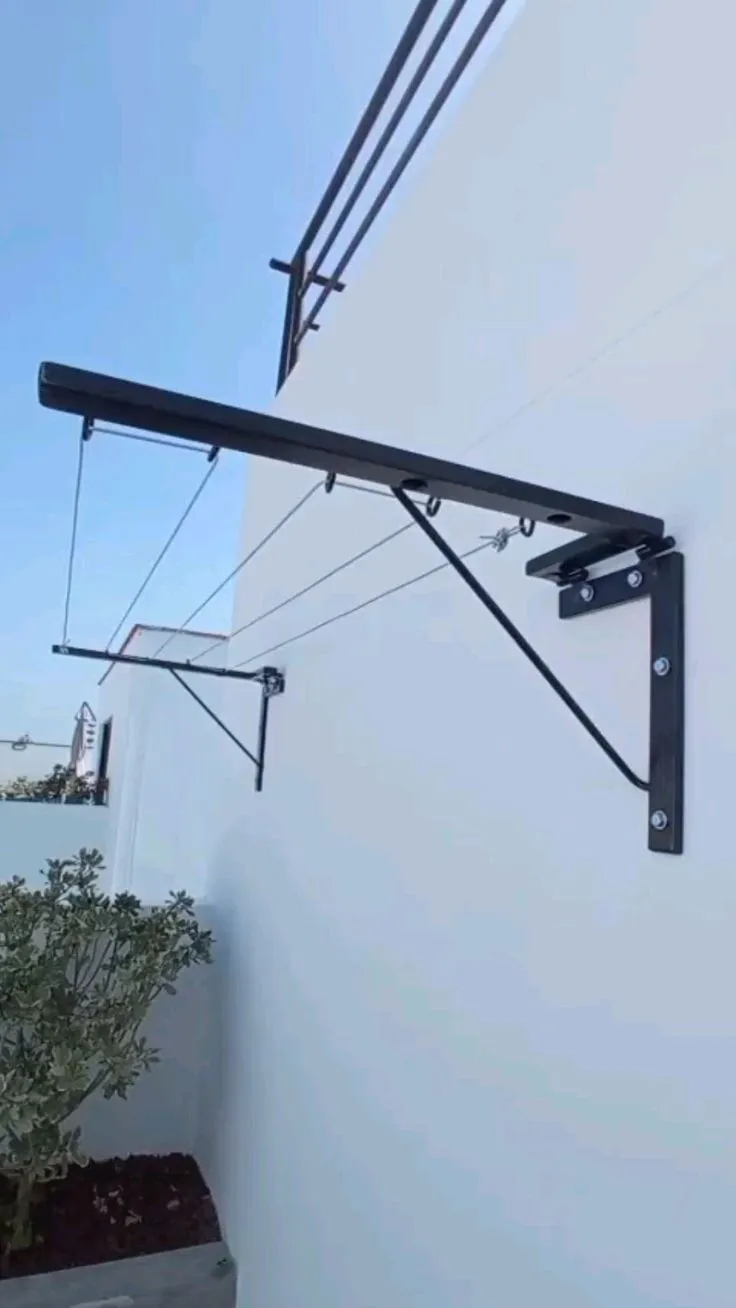 Tendedero abatible de herrería instalado en muro exterior – tendederos plegables por mayoreo en Culiacán
